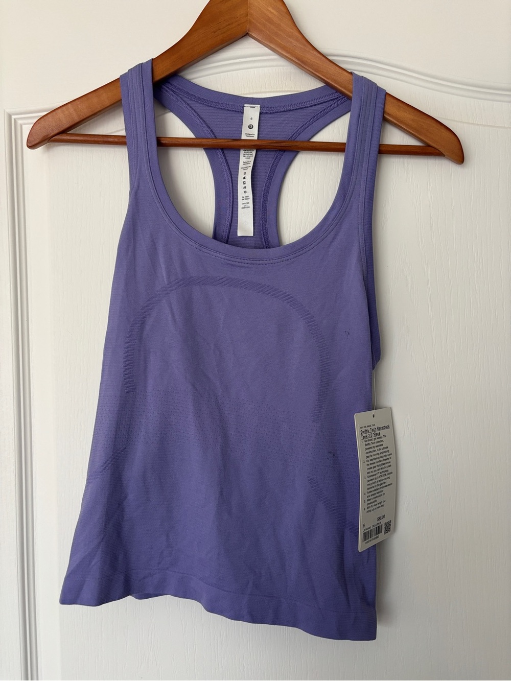 NWT Lululemon Swiftly Tech Yank Top. Women's Purple Racerback Tank Top